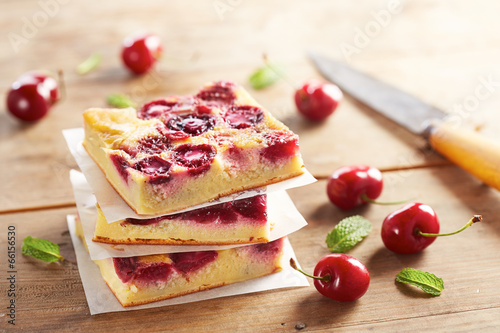 Photo: Cherry clafoutis pie on wooden table Cherry clafoutis pie on wooden table