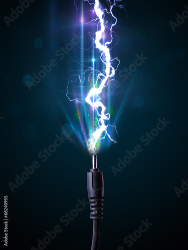 Photo: Electric cable with glowing electricity lightning Electric cable with glowing electricity lightning