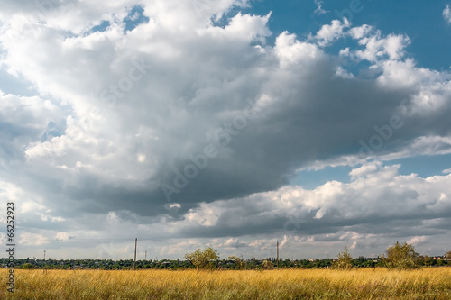 Photo: Storm clouds over the field Storm clouds over the field