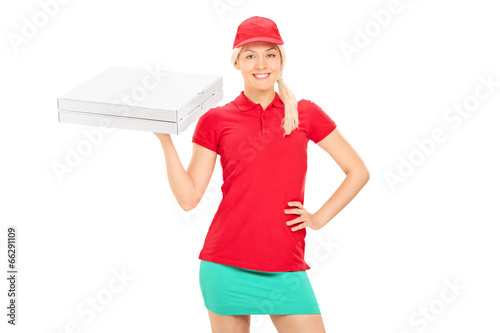 Photo: Delivery girl holding two boxes of pizza Delivery girl holding two boxes of pizza