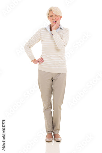 Photo: senior woman having toothache senior woman having toothache