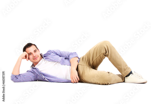 Photo: Man lying on floor Man lying on floor