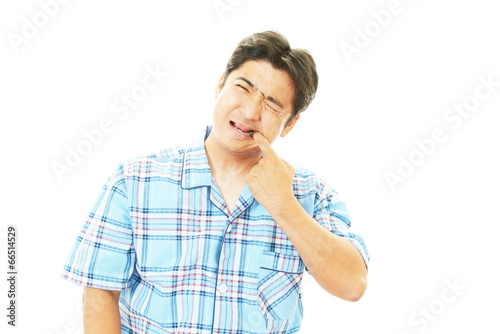 Photo: 歯痛を訴える男性 歯痛を訴える男性
