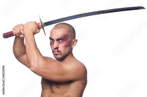 Photo: Man with sword isolated on white Man with sword isolated on white