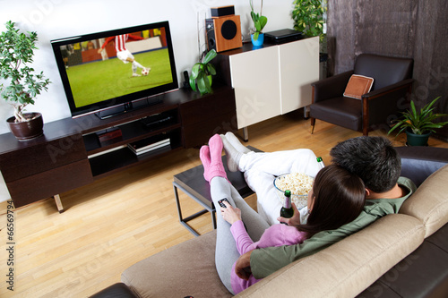 Photo: Couple watching sport Couple watching sport