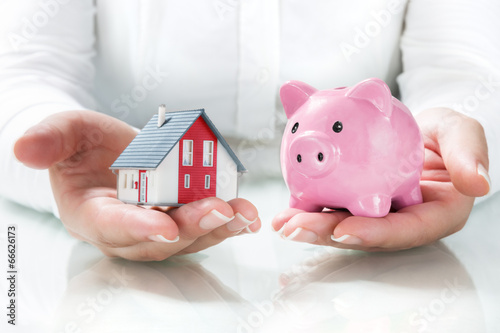 Photo: concept of mortgage and savings concept of mortgage and savings