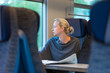 Lady traveling by train. Lady traveling by train.