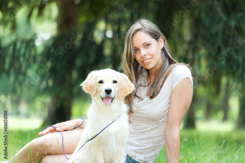 Photo: Smiling girl and her dog Smiling girl and her dog