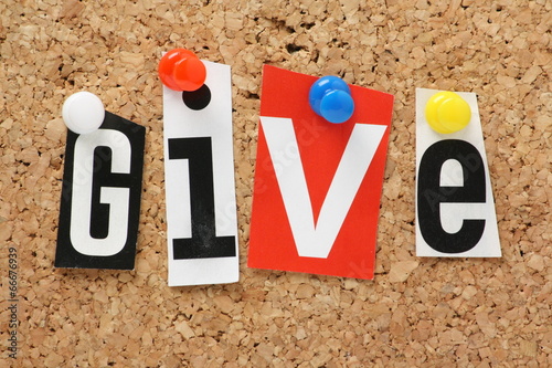Photo: The word Give on a cork notice board The word Give on a cork notice board
