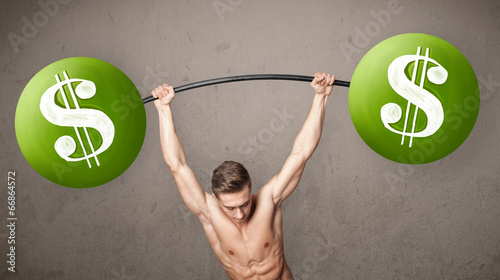 Photo: muscular man lifting green dollar sign weights muscular man lifting green dollar sign weights