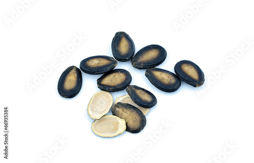 Photo: Dry Watermalon Seeds on white background Dry Watermalon Seeds on white background