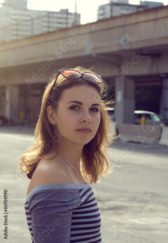 Photo: Girl in striped shirt at sunset Girl in striped shirt at sunset