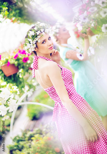 Photo: Two beautiful women in the huge garden Two beautiful women in the huge garden