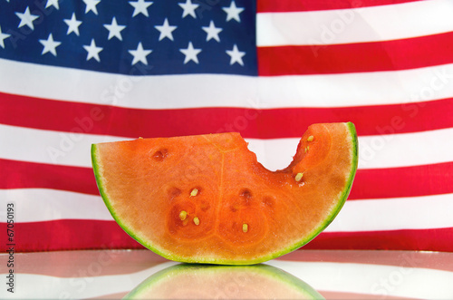 Photo: juicy watermelon with American flag juicy watermelon with American flag