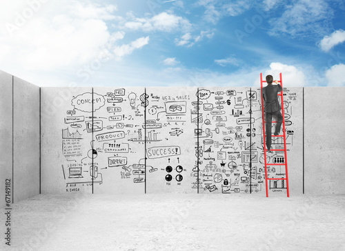 Photo: businessman climbing businessman climbing
