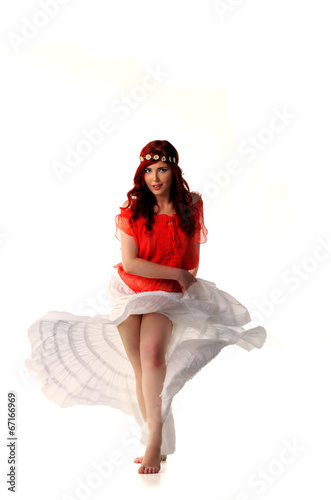 Photo: young redhead dancer in ethnic costume young redhead dancer in ethnic costume