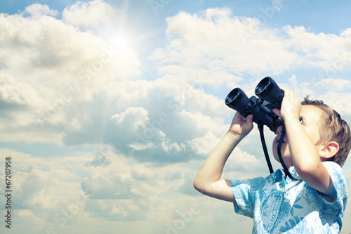 Photo: boy searching with binoculars boy searching with binoculars