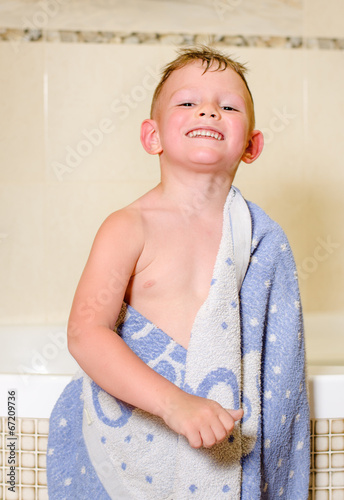 Photo: Mischievous little boy in his bath Mischievous little boy in his bath