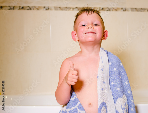 Photo: Mischievous little boy in his bath Mischievous little boy in his bath