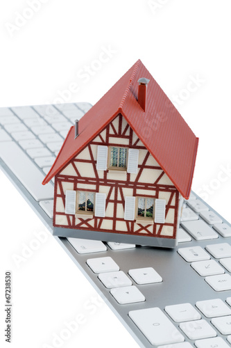 Photo: Wohnhaus auf Tastatur Wohnhaus auf Tastatur