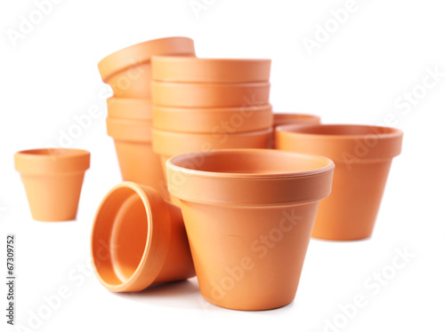 Photo: Clay flower pots, isolated on white Clay flower pots, isolated on white