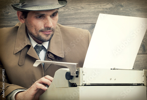 Photo: man and typewriter man and typewriter