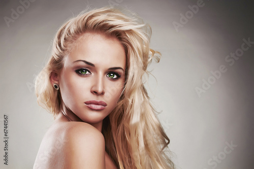 Photo: Fashion portrait of young beautiful woman.Sexy Blond girl Fashion portrait of young beautiful woman.Sexy Blond girl