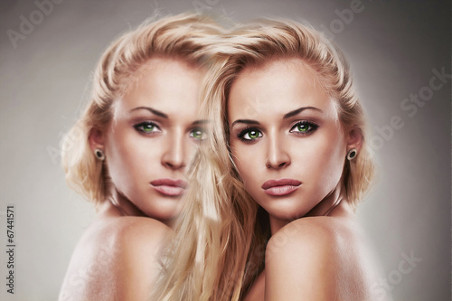 Photo: art portrait of young beautiful woman.Sexy.two girls effect art portrait of young beautiful woman.Sexy.two girls effect