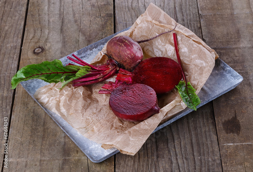 Photo: Organic beetroot on a rustic wooden background Organic beetroot on a rustic wooden background