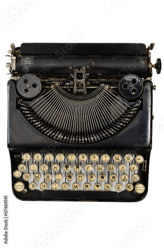Photo: vintage portable typewriter with Cyrillic letters vintage portable typewriter with Cyrillic letters