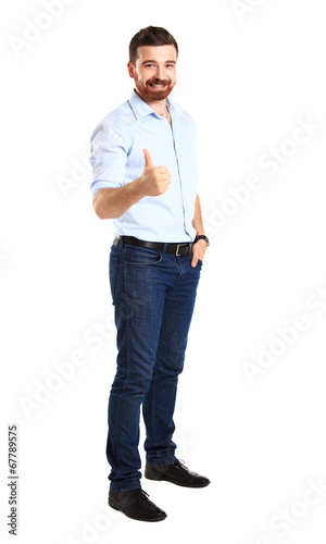 Photo: Happy man with thumbs up gesture, isolated on white Happy man with thumbs up gesture, isolated on white