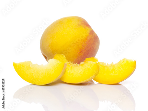 Photo: Sliced peach isolated on white background Sliced peach isolated on white background