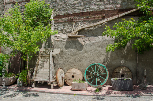Photo: Old wood plow, tumbrel and wheels Old wood plow, tumbrel and wheels