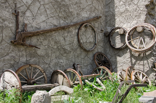 Photo: Old wood plow and wheels Old wood plow and wheels