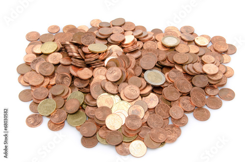 Photo: Growth concept with a green small plant planted in coins Growth concept with a green small plant planted in coins