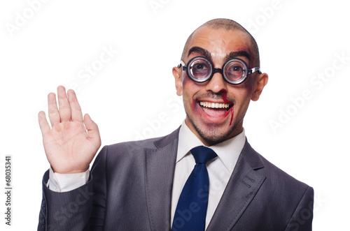 Photo: Badly beaten businessman isolated on white Badly beaten businessman isolated on white