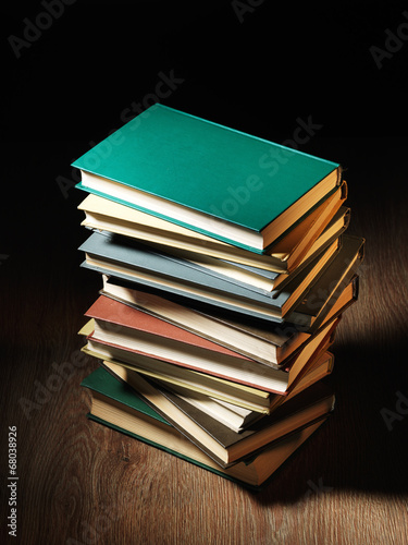 Photo: Stack of hardcover books Stack of hardcover books