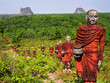 Statues of Buddhist Monks in the Forest, Mawlamyine, Myanmar Statues of Buddhist Monks in the Forest, Mawlamyine, Myanmar