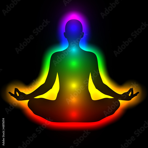 Illustration: Silhouette of woman in meditation, energy body, aura, chakras Silhouette of woman in meditation, energy body, aura, chakras