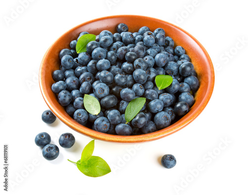 Photo: blueberries in a clay bowl blueberries in a clay bowl