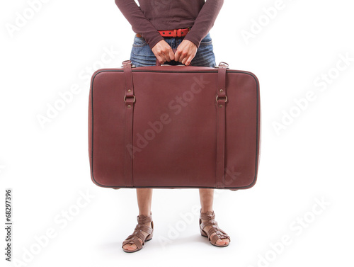 Photo: woman holding a suitcase woman holding a suitcase