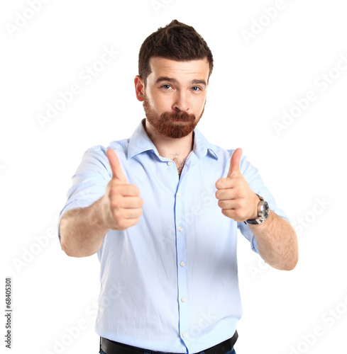 Photo: Happy man with thumbs up gesture, isolated on white Happy man with thumbs up gesture, isolated on white