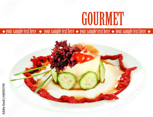 Photo: Delicious dish on plate isolated on white Delicious dish on plate isolated on white