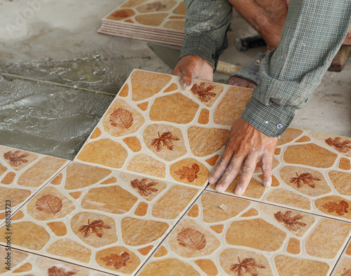 Photo: Tiler install ceramic tiles Tiler install ceramic tiles