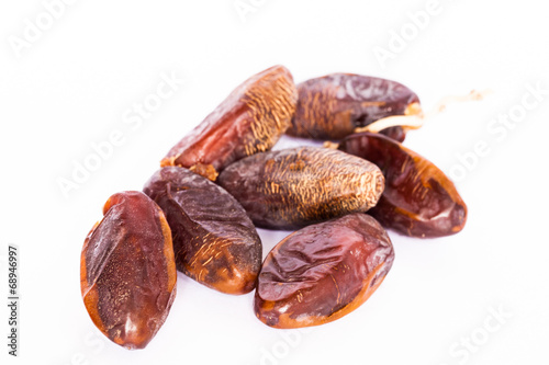 Photo: Dates on white background. Dates on white background.