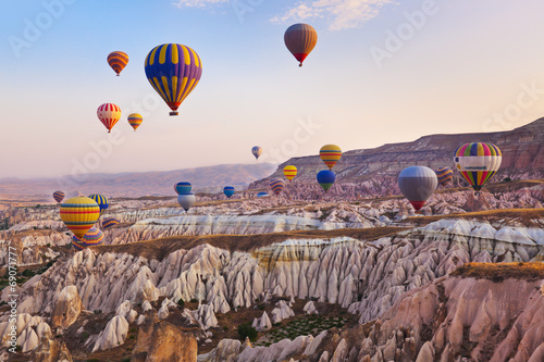 Photo: Hot air balloon flying over Cappadocia Turkey Hot air balloon flying over Cappadocia Turkey