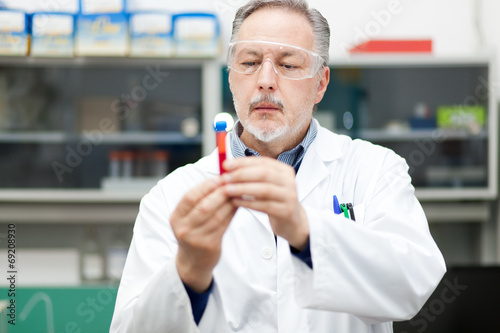 Photo: Male scientist at work in a laboratory Male scientist at work in a laboratory