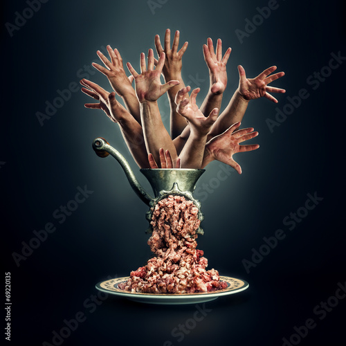 Photo: Meat grinder on a black background Meat grinder on a black background