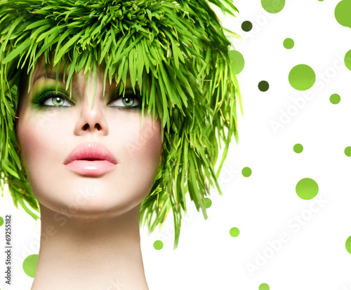 Photo: Beauty woman with fresh green grass hair. Nature model girl Beauty woman with fresh green grass hair. Nature model girl
