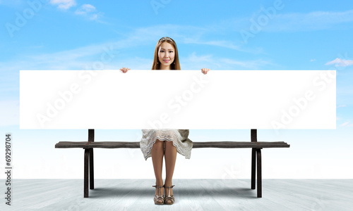 Photo: Girl with banner Girl with banner